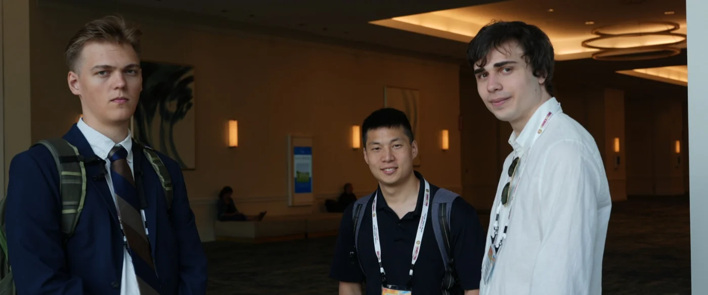 Jonathan Oh with two members of the Bond4 Waste team in a conference hall